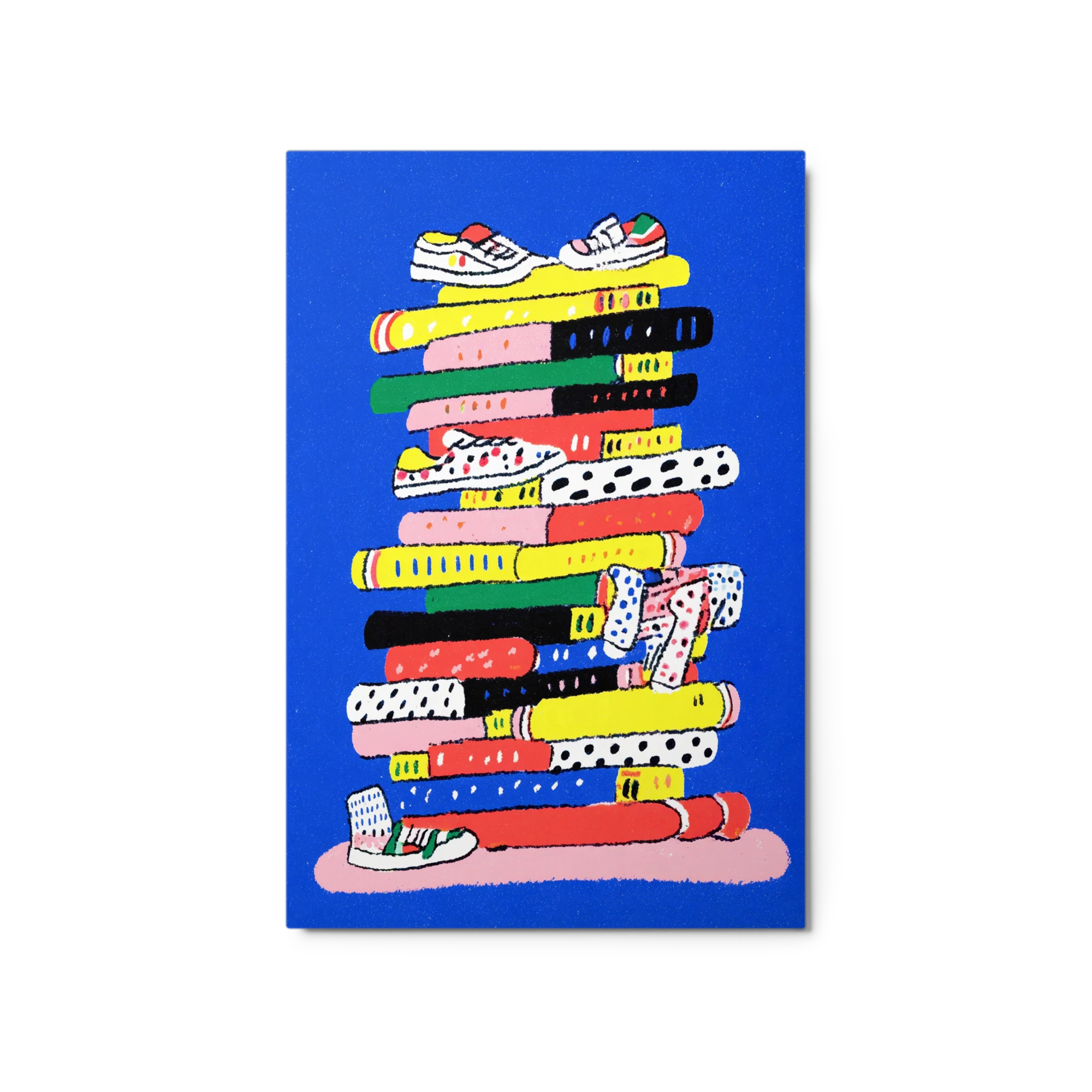 Stack of Books and Sneakers